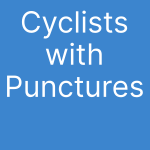 cyclists with punctures