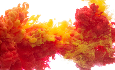 yellow and red liquid dye in water
