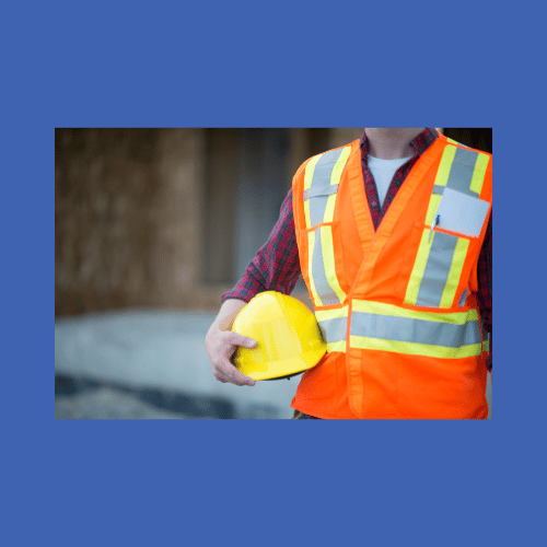 Health Safety High viz jacket and helmet on blue background
