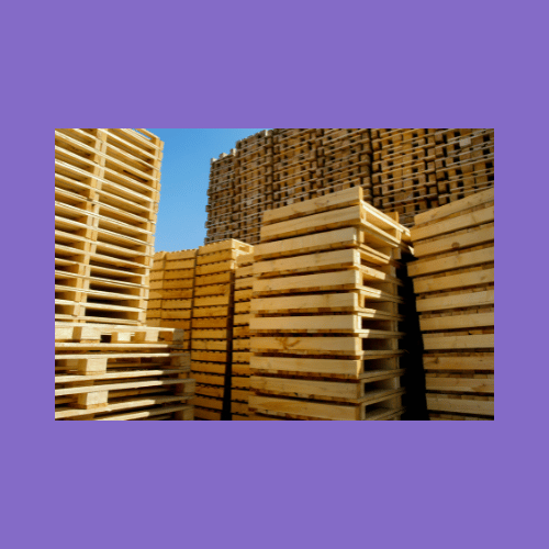 Packaging piles of wooden pallets on purple background