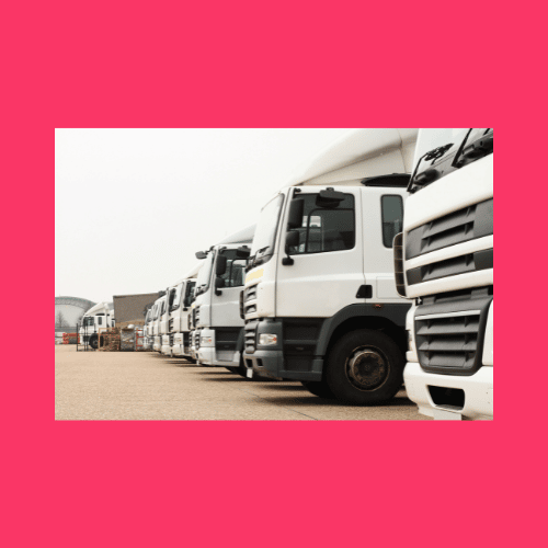deliveries row of lorries on red background