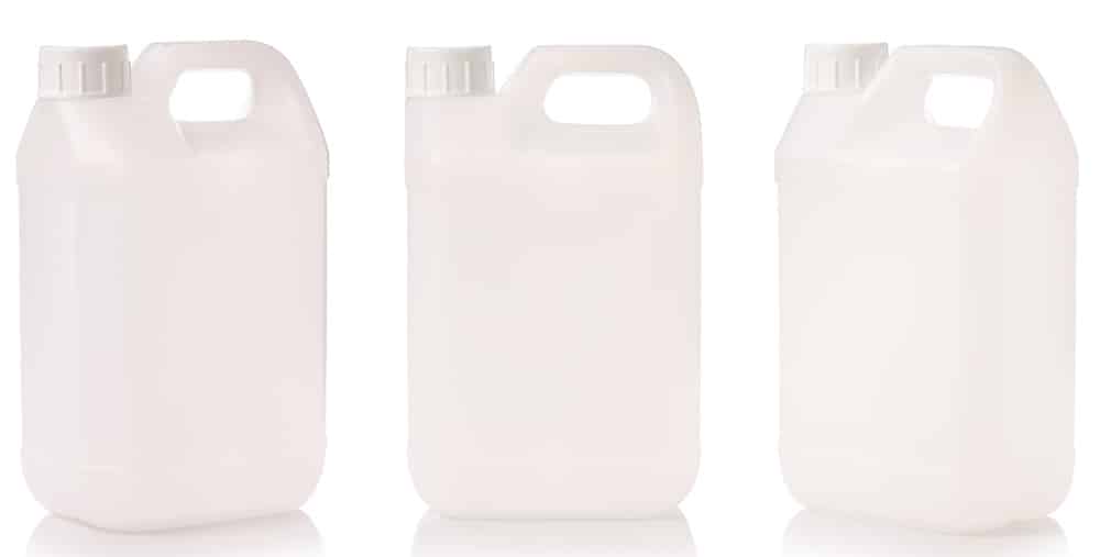 row of three white blank jerrycans