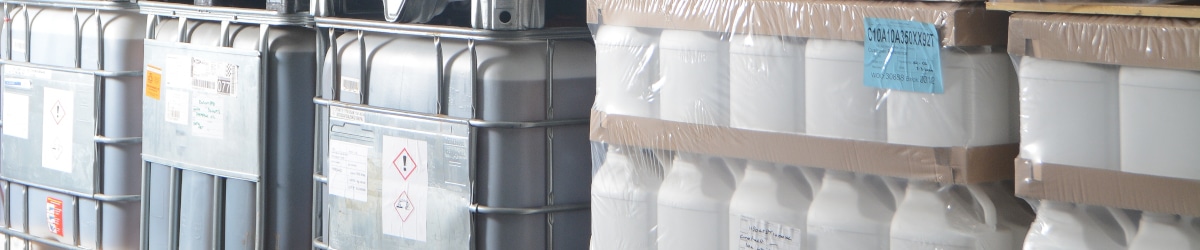 packaging-grotech-warehouse ibcs and stacks of empty jerrycans in the grotech warehouse