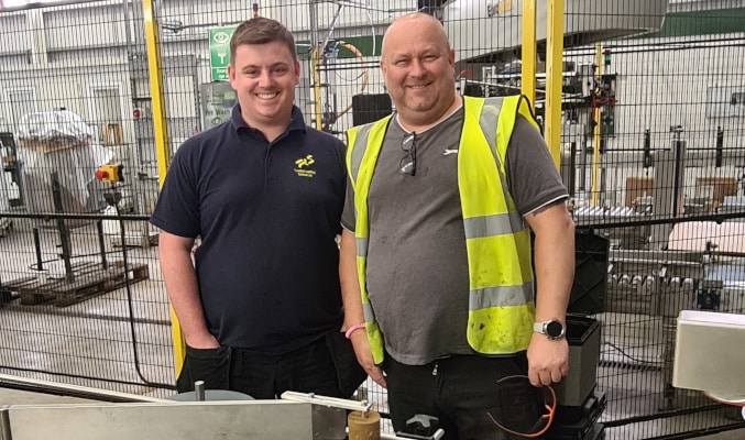 installing the new labeller on the factory floor