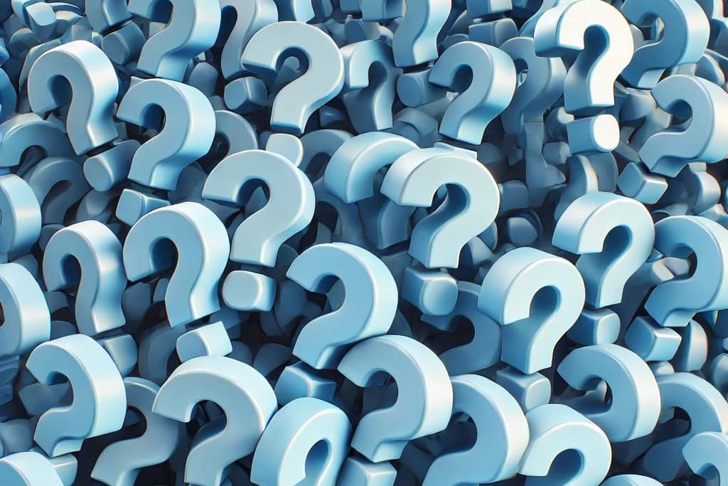 jumble of blue 3D question marks