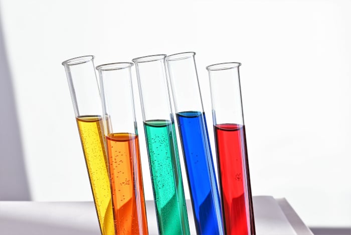 test tubes filled with different coloured liquids