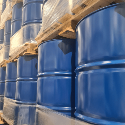 customers-control-brand metal drums in the grotech warehouse