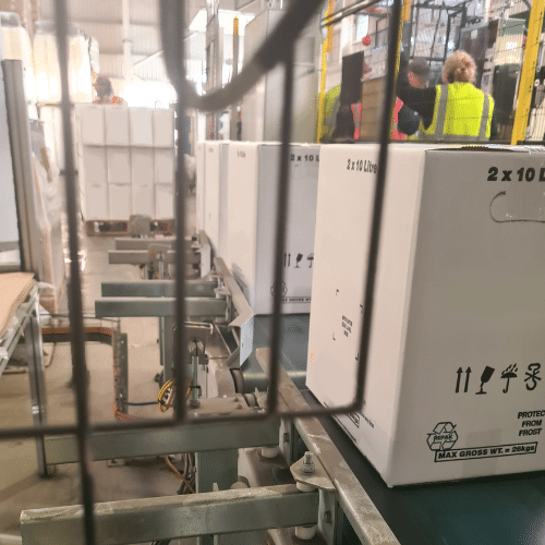 we-sign-ndas boxes on a grotech packing line